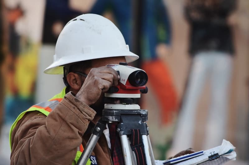 image of man in hard hard doing construction