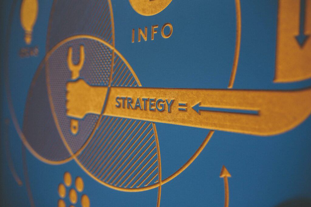 A close-up of a graphic design with the words info and strategy